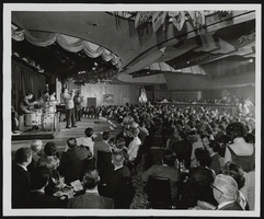 Louis Prima performing on stage at the Sands Hotel: photographs