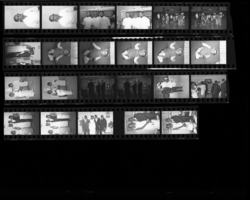 Set of negatives by Clinton Wright including Missie Stevenson's baby, a wedding, Jackson Barber Shop advertisements, and father and son dodgeball, 1966