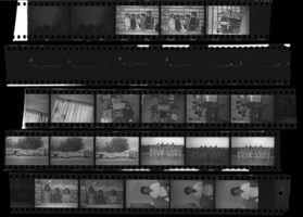 Set of negatives by Clinton Wright including Gama Rho Chapter for fashion show publicity, Sugar Hill football team for McDaniel, Les Femmes Douze, Joann Pughsley, Ruth Hicks' son, Employees at Sight & Sound, and Beautician at Continental, 1969
