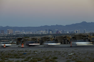 Construction equipment along 215 the Beltway in the Nortwest with the Las Vegas skyline, Las Vegas, Nevada: digital photograph