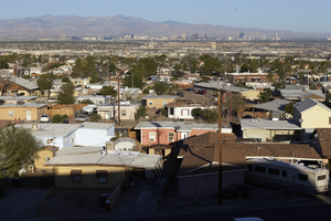 Original townsite homes with Las Vegas skyline, Henderson, Nevada: digital photograph