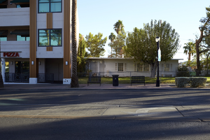 Original townsite home next to modern multi-story development, Henderson, Nevada: digital photograph