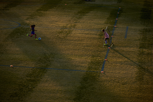Soccer practice in the Anthem Hills Park detention basin, Henderson, Nevada: digital photograph