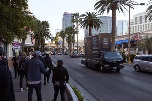 Automobile and pedestrian traffic along the Las Vegas Strip, Las Vegas, Nevada: digital photograph