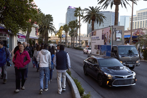 Automobile and pedestrian traffic along the Las Vegas Strip, Las Vegas, Nevada: digital photograph