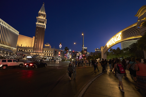Traffic and pedestrians on Las Vegas Boulevard at dusk, Las Vegas, Nevada: digital photograph