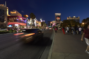Traffic and pedestrians on Las Vegas Boulevard at dusk, Las Vegas, Nevada: digital photograph