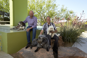 Architects John Klai and Jon Sparer with dogs at home, Las Vegas, Nevada: digital photograph