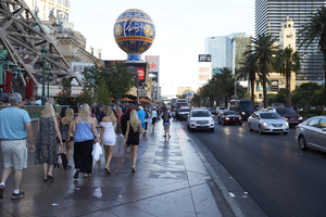 Pedestrian and auto traffic on Las Vegas Boulevard, Las Vegas, Nevada: digital photograph