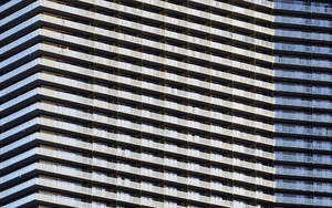 Man on his tower balcony at the The Cosmopolitan hotel and casino, Las Vegas, Nevada: digital photograph