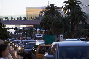 Pedestrian and auto traffic on Las Vegas Boulevard, Las Vegas, Nevada: digital photograph