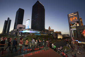 Pedestrians use overpass near The Cosmopolitan Hotel and Casino, Las Vegas, Nevada: digital photograph