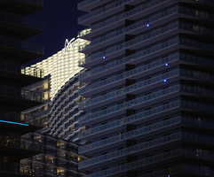 Aria hotel tower behind towers at The Cosmopolitan, Las Vegas, Nevada: digital photograph