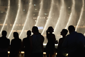 Tourists watching the Bellagio fountains, Las Vegas, Nevada: digital photograph