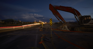 Construction equipment with stormcould to the south, Las Vegas, Nevada: digital photograph