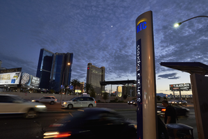 Bus stop on Sahara Avenue near Las Vegas Boulevard looking west at dusk, Las Vegas, Nevada: digital photograph