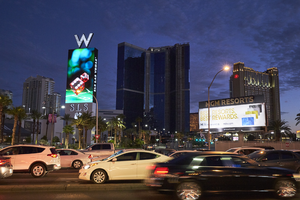 Traffic on Sahara Avenue with the Fountainebleau porject looking south at dusk, Las Vegas, Nevada: digital photograph