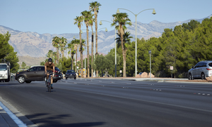 Bicyclist on West Sahara Avenue looking west, Las Vegas, Nevada: digital photograph
