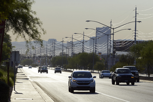 Traffic and power lines on West Sahara looking east in early morning light, Las Vegas, Nevada: digital photograph