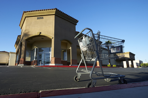 Shopping cart at an empty commercial property at East Sahara Avenue and Maryland Parkway, Las Vegas, Nevada: digital photograph
