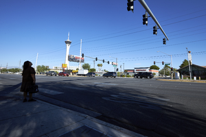 Pedestrian at 6th Street and East Sahara Avenue looking west, Las Vegas, Nevada: digital photograph