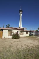 A home and the Stratosphere tower as seen from South Santa Clara Drive near East Sahara Avenue looking west, Las Vegas, Nevada: digital photograph
