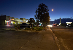 Businesses and traffic on East Sahara Avenue near Maryland Parkway looking west at dusk, Las Vegas, Nevada: digital photograph