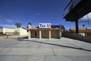 Billboard above the Tax 1 on East Sahara Avenue looking north, Las Vegas, Nevada: digital photograph