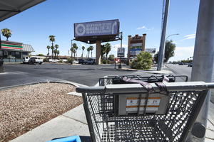 Shopping cart on East Sahara Avenue at Maryland Parkway looking east, Las Vegas, Nevada: digital photograph