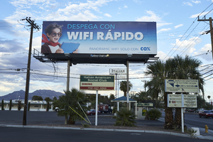 Signs on East Sahara Avenue east of South Eastern Avenue looking east, Las Vegas, Nevada: digital photograph