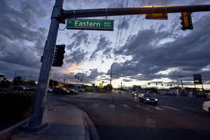 Traffic on East Sahara Avenue and Eastern Avenue looking west at sunset, Las Vegas, Nevada: digital photograph