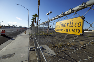 Tiberti Fence Company sign and product along Fremont Street near East Sahara Avenue looking southeast, Las Vegas, Nevada: digital photograph