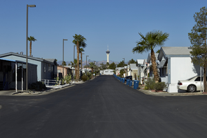Central Drive and the Straosphere tower in the Maycliff Senior Mobile Home Part off East Sahara Avenue at Sandhill Road looking west, Las Vegas, Nevada: digital photograph