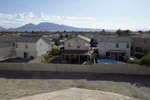 Neighborhood near the freeway overpass at East Sahara Avenue looking east, Las Vegas, Nevada: digital photograph
