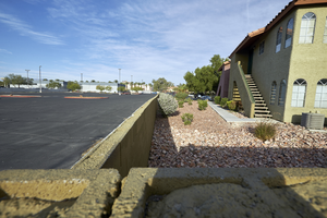 A deviding wall between Multi-family residential and commercial development on West Sahara Avenue and Arville Street looking west, Las Vegas, Nevada: digital photograph