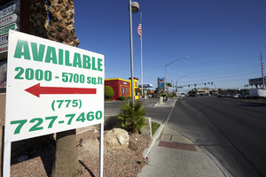 Advertising sign on Jones Boulevard south of West Sahara Avenue, looking north, Las Vegas, Nevada: digital photograph