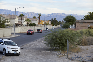 Cars on Walnut street with different types of single family housing, looking north, Las Vegas, Nevada: digital photograph