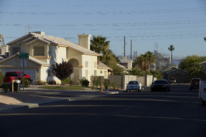 Power lines and single family housing west of Sloan Lane and south of East Sahara Avenue, looking north, Las Vegas, Nevada: digital photograph