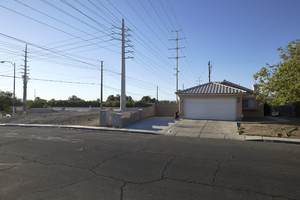 Power lines and single family housing west of Sloan Lane and south of East Sahara Avenue, looking south, Las Vegas, Nevada: digital photograph