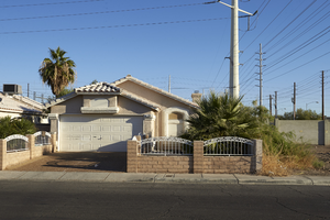 Single family homes and power lines off Sloan Lane south of East Sahara Avenue, looking northeast, Las Vegas, Nevada: digital photograph