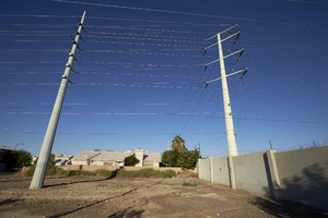 Single family homes and power lines off Sloan Lane south of East Sahara Avenue, looking west, Las Vegas, Nevada: digital photograph