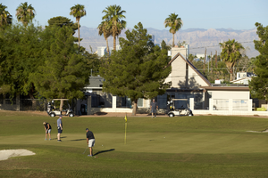 Golfers playing The Club at Sunrise Golf Course, looking west, Las Vegas, Nevada: digital photograph