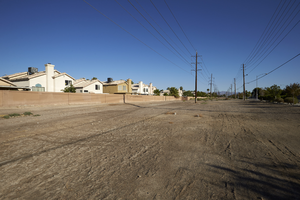 Single family homes along the Sloan Lane power easement, looking north, Las Vegas, Nevada: digital photograph