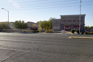 A liquor store and single family housing, looking southeast, Las Vegas, Nevada: digital photograph
