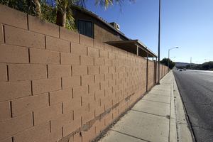 Block wall and a sidewalk along East Sahara Avenue east of Sloan Lane, looking east, Las Vegas, Nevada: digital photograph