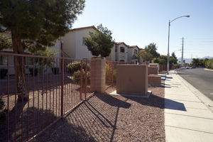 Utility boxes and apartments off East Sahara Avenue west of Tree Line Drive, looking south, Las Vegas, Nevada: digital photograph