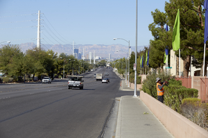 Traffic and worker on East Sahara Avenue west of Tree Line Drive, looking west, Las Vegas, Nevada: digital photograph
