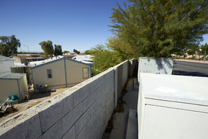 Utility boxes and a trailer park along East Sahara Avenue west of Tree Line Drive, looking west, Las Vegas, Nevada: digital photograph