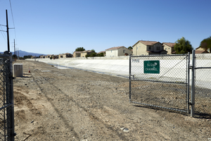 Single family homes along the Sloan Channel, looking south, Las Vegas, Nevada: digital photograph