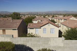 Single family home rooftops with a Las Vegas Strip view as seen from Hollywood Boulevard south of East Sahara Avenue, looking west, Las Vegas, Nevada: digital photograph